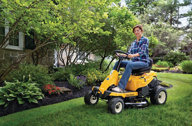 Cub Cadet 30 inch riding mower being used