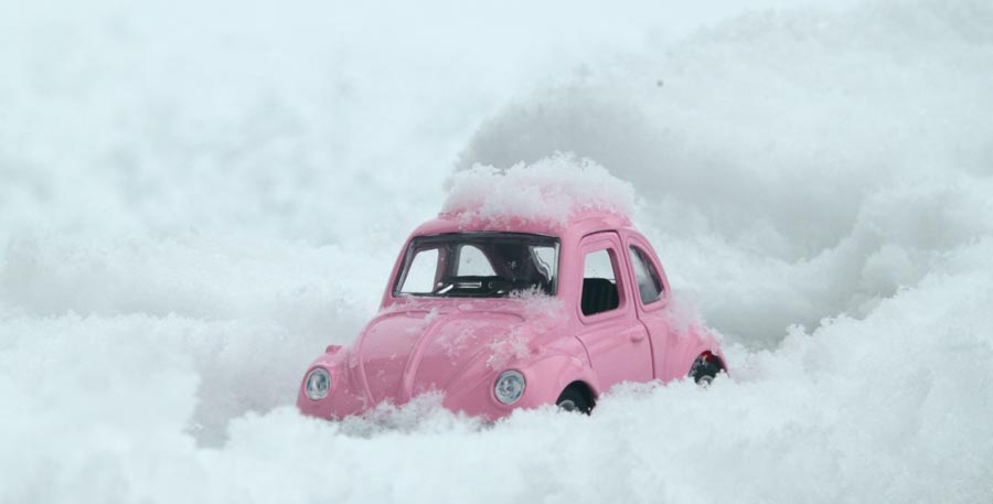 Model car in heavy snow