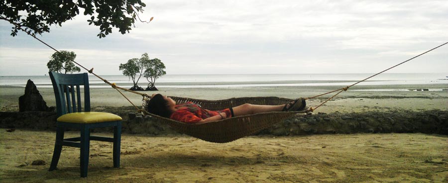 Person lying in hammock
