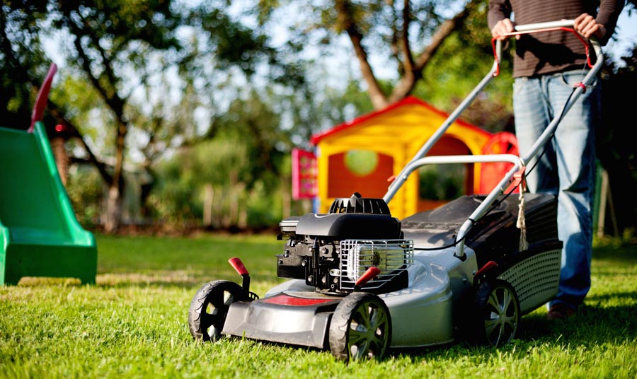 Person mowing lawn